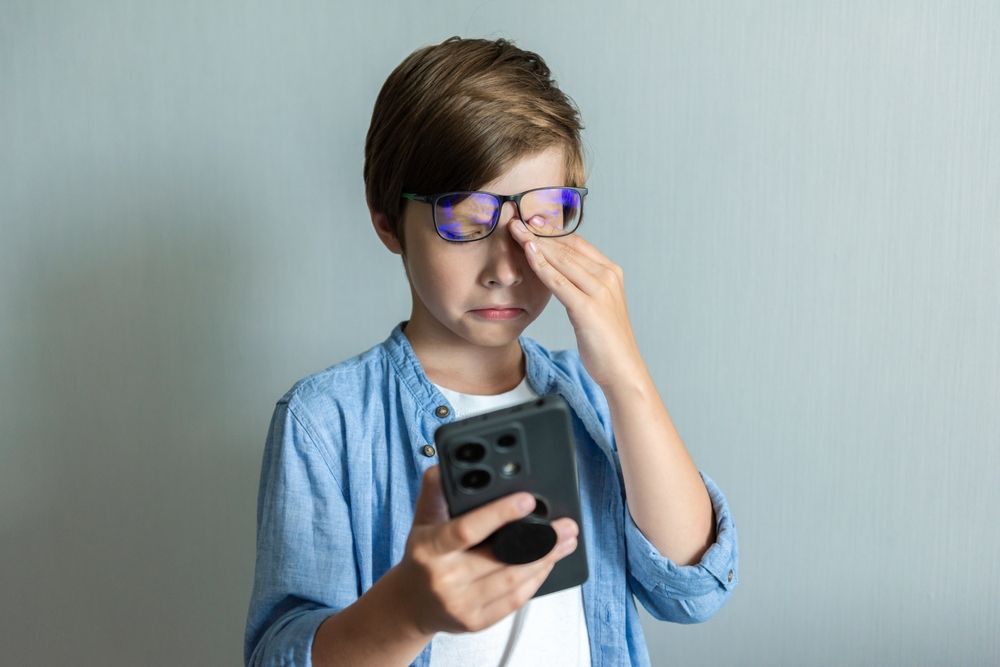 Child,Boy,Rubs,His,Eyes,For,Looking,At,Phone.,Hyperopia